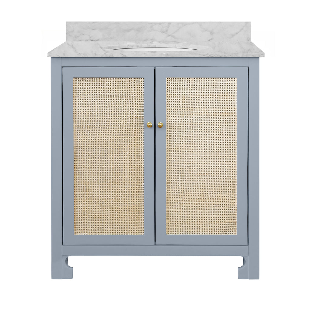 Bath Vanity in Matte Light Blue Lacquer with Cane Front Doors, White Marble Top, Porcelain Sink, and Polished Brass Knobs
