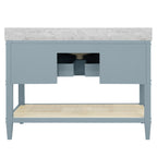 Bath Vanity in Matte Light Blue Lacquer with Open Cane Shelf, White Marble Top, Porcelain Sink, and Antique Brass Ring Hardware, 48" Wide