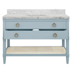 Bath Vanity in Matte Light Blue Lacquer with Open Cane Shelf, White Marble Top, Porcelain Sink, and Antique Brass Ring Hardware, 48" Wide