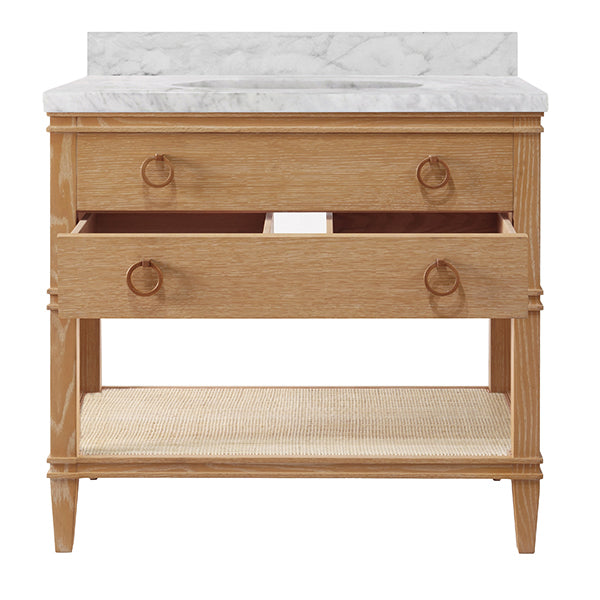 Bath Vanity in Cerused Oak with Open Cane Shelf, White Marble Top, Porcelain Sink, and Antique Brass Ring Hardware