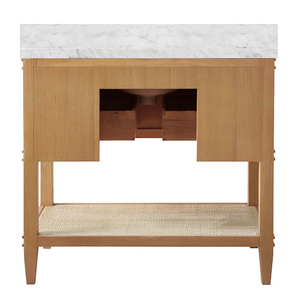 Bath Vanity in Cerused Oak with Open Cane Shelf, White Marble Top, Porcelain Sink, and Antique Brass Ring Hardware